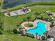 A scenic view of the community pool featuring a playground, gazebo, and a picnic area for a fun recreational space at 11308 Callaway Pond Dr, Riverview, FL 33579