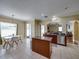 Kitchen with eat in area, tile floors, granite countertops and modern decor at 11308 Callaway Pond Dr, Riverview, FL 33579