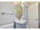 Bathroom featuring a modern sink with vanity and a decorative mirror at 1821 20Th N Ave, St Petersburg, FL 33713