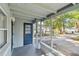 View of screened porch and fenced-in backyard at 1821 20Th N Ave, St Petersburg, FL 33713