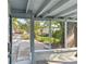 View from screened porch into the home's backyard at 1821 20Th N Ave, St Petersburg, FL 33713