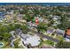 Aerial view of a residential area with water in the background, highlighting the property's location and neighborhood at 1842 Nebraska Ne Ave, St Petersburg, FL 33703