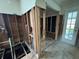 Stripped living room showing electrical, plumbing, and framing; ready for renovation at 1842 Nebraska Ne Ave, St Petersburg, FL 33703