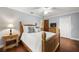 Comfortable bedroom with wood floors, a ceiling fan, and a view of the entrance to another room at 1916 38Th W St, Bradenton, FL 34205