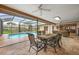 Relaxing screened-in patio with a lovely pool and outdoor dining area, perfect for entertaining at 1916 38Th W St, Bradenton, FL 34205