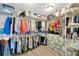 Walk-in closet featuring wire shelving and plenty of space for storage and organization at 19592 Breynia Dr, Lutz, FL 33558