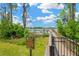 Community dock and camp lake for fishing and scenic relaxation at 19592 Breynia Dr, Lutz, FL 33558