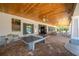 Community pool house with picnic tables and pool rules at 19592 Breynia Dr, Lutz, FL 33558