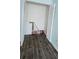 A closet with bi-fold doors offering ample storage space, complete with modern flooring at 1960 Lakewood Club Dr S # 2-F, St Petersburg, FL 33712
