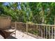 Scenic view from the balcony of lush trees at 21 Pelican Pl, Belleair, FL 33756