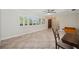 The expansive living room has tile floors, plantation shutters, and arched doorways at 2216 El De Oro Dr, Clearwater, FL 33764