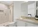 Spa-like bathroom featuring glass-enclosed shower and sleek vanity for modern appeal at 3411 W El Prado Blvd, Tampa, FL 33629