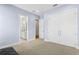 Well-lit bedroom showcasing ensuite bath and large closet for ample storage at 3411 W El Prado Blvd, Tampa, FL 33629