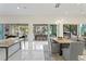 Open floorplan with seamless transitions between the living, dining, and kitchen areas at 3411 W El Prado Blvd, Tampa, FL 33629