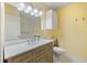 Bathroom showcasing a modern vanity with a marble countertop and brushed nickel fixtures at 3585 41St S Ter # 227, St Petersburg, FL 33711
