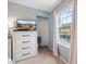 Bright bedroom with a television and dresser at 3585 41St S Ter # 227, St Petersburg, FL 33711