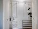 A white closet with double doors and an adjustable shelving system to maximize storage at 3585 41St S Ter # 227, St Petersburg, FL 33711