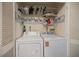 A functional laundry room featuring a side-by-side washer and dryer at 3585 41St S Ter # 227, St Petersburg, FL 33711