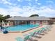 Community pool with lounge chairs and manicured grounds at 3585 41St S Ter # 227, St Petersburg, FL 33711