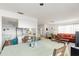 Spacious, open-concept living and dining area creates an inviting atmosphere for gatherings and relaxation at 4424 Pelorus Dr, New Port Richey, FL 34652