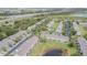 Picturesque community featuring a swimming pool, a pond, and scenic highway views at 4603 Barnstead Dr, Riverview, FL 33578