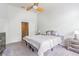 Spacious bedroom featuring a ceiling fan and neutral decor at 4603 Barnstead Dr, Riverview, FL 33578