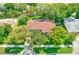 Aerial view of a single Gathering home featuring mature trees, a landscaped yard, and neighborhood at 533 Keene Rd, Largo, FL 33771