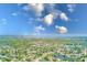Panoramic aerial view showcasing city with waterfront and clear blue skies at 533 Keene Rd, Largo, FL 33771