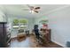 Office space with hardwood floors, neutral paint, and multiple windows for ample light at 533 Keene Rd, Largo, FL 33771