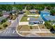 Charming single-story home with a well-manicured lawn, quaint white picket fence, and ample parking space at 5367 5Th N Ave, St Petersburg, FL 33710