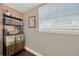 Stylish bookshelf featuring books, records, and decorative items in a bright room at 5367 5Th N Ave, St Petersburg, FL 33710
