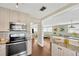 Charming kitchen features stainless steel appliances and granite countertops at 5367 5Th N Ave, St Petersburg, FL 33710