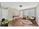 Cozy living room showcasing hardwood floors, lots of natural light, and comfortable seating at 5367 5Th N Ave, St Petersburg, FL 33710