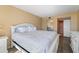 Main bedroom featuring a king-sized bed, neutral color scheme and mirrored closet doors at 6021 Bahia Del Mar Cir # 534, St Petersburg, FL 33715
