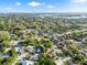 Overhead perspective of homes in a neighborhood with views of a lake at 715 Charlotte Ave, Tarpon Springs, FL 34689