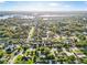 Scenic aerial view of a neighborhood with tree-lined streets at 715 Charlotte Ave, Tarpon Springs, FL 34689