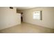 Open concept living room featuring lots of natural light and neutral paint at 721 75Th N Ave, St Petersburg, FL 33702