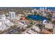 Condo building near a lake with city skyline views in the background surrounded by trees at 750 Burlington N Ave # 4L, St Petersburg, FL 33701