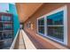 Long outdoor balcony hallway with city views at 750 Burlington N Ave # 4L, St Petersburg, FL 33701
