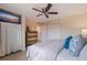 Bright and comfortable bedroom with a TV and built in storage at 750 Burlington N Ave # 4L, St Petersburg, FL 33701