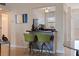Efficient kitchen featuring stainless steel appliances and a breakfast bar with views to the living area at 750 Burlington N Ave # 4L, St Petersburg, FL 33701