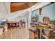 Finished attic features wood laminate flooring and ample room for storage at 7500 N Ola Ave, Tampa, FL 33604