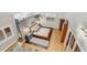 Modern bedroom with hardwood floors, neutral paint, and a large framed print at 7500 N Ola Ave, Tampa, FL 33604