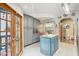 Bright and airy kitchen with gray cabinetry and a charming center island at 7500 N Ola Ave, Tampa, FL 33604
