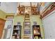 Unique living room showcases loft with ladder, offering distinctive charm and character at 7500 N Ola Ave, Tampa, FL 33604