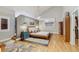 Spacious main bedroom with vaulted ceilings, hardwood floors, and a walk-in closet at 7500 N Ola Ave, Tampa, FL 33604