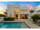 Luxury home backyard with pool, outdoor seating, and modern design, perfect for relaxation and entertaining at 7608 Antilla St, Tampa, FL 33625