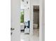 View from bedroom to bathroom with a sleek tub at 7608 Antilla St, Tampa, FL 33625