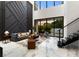 Bright living room with high ceilings and an indoor/outdoor living concept at 7608 Antilla St, Tampa, FL 33625