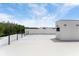 Expansive rooftop deck offering panoramic views and modern railing accents, and lots of space at 7608 Antilla St, Tampa, FL 33625